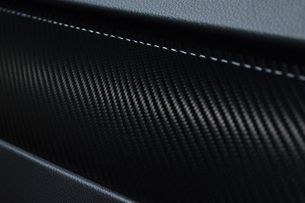 Composite material can be used to produce carbon foil used in automotive applications